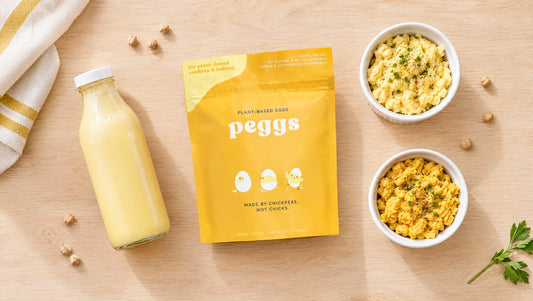 Flat lay of the real Peggs pouch alongside other plant-based egg alternative products and scrambled samples